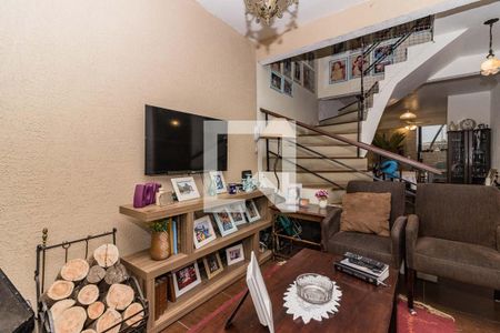 Sala de casa de condomínio à venda com 3 quartos, 220m² em Santo Antônio, Porto Alegre