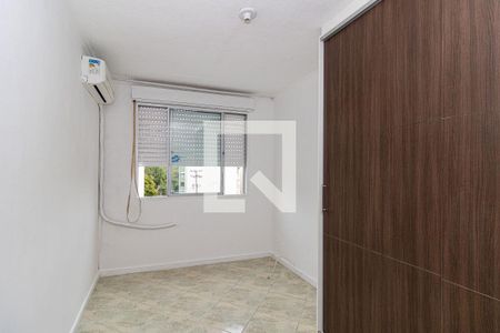 Quarto 2 de apartamento para alugar com 2 quartos, 52m² em Jardim Itu, Porto Alegre