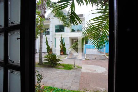 Sala - Vista de casa de condomínio à venda com 3 quartos, 195m² em Sarandi, Porto Alegre