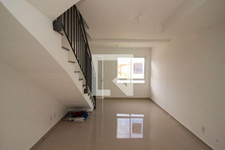 Sala de casa de condomínio para alugar com 2 quartos, 60m² em Vila Nova, Porto Alegre