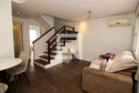 Sala de casa de condomínio à venda com 3 quartos, 123m² em Vila Nova, Porto Alegre