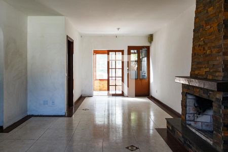 Sala de casa à venda com 3 quartos, 240m² em Ipanema, Porto Alegre