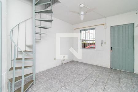 Sala de casa de condomínio à venda com 2 quartos, 70m² em Coronel Aparicio Borges, Porto Alegre