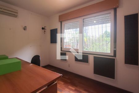 Quarto 2 de casa à venda com 3 quartos, 251m² em Auxiliadora, Porto Alegre