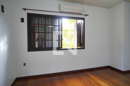 Quarto 1 de casa para alugar com 2 quartos, 100m² em Santa Maria Goretti, Porto Alegre