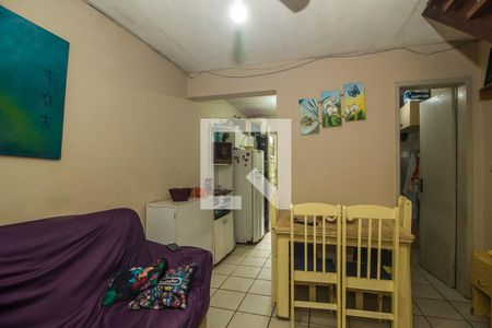 Sala de casa de condomínio para alugar com 2 quartos, 48m² em Vila Nova, Porto Alegre